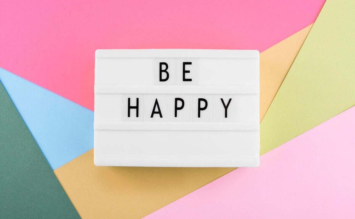 Happiness message on lightbox arrangement