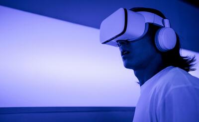 Man wearing VR headset in operational base