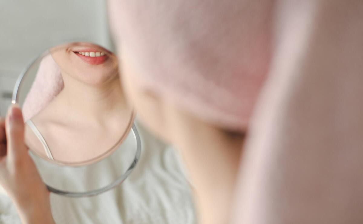 a woman wearing a white shirt