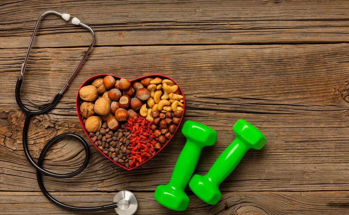 Box of nuts and spices on wood table