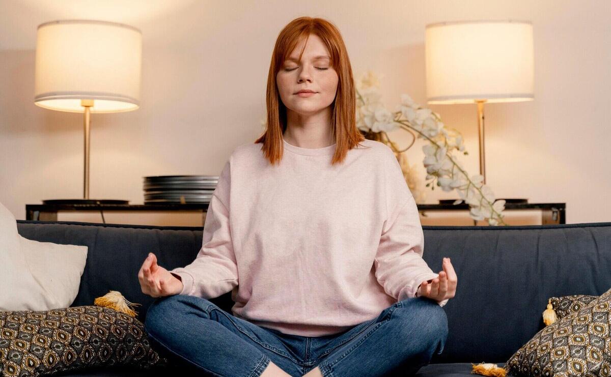 Portrait woman at home meditating