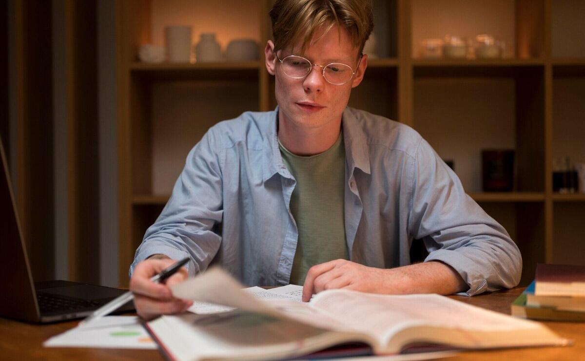 Young man learning in a virtual classroom