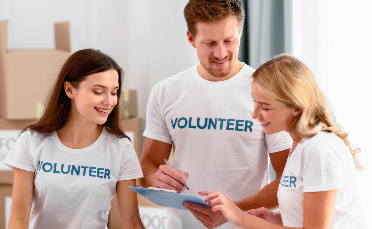 Volunteers at work preparing donations for charity