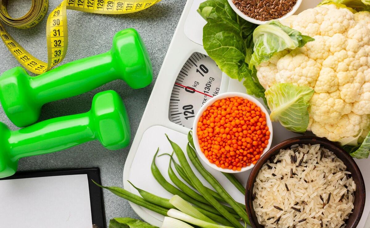 Flat lay of vegetables and weights