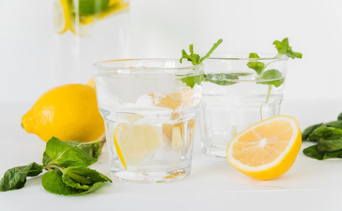 Glasses with lemon mint water